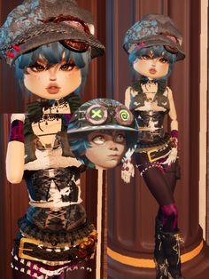 two dolls are dressed up in hats and clothing