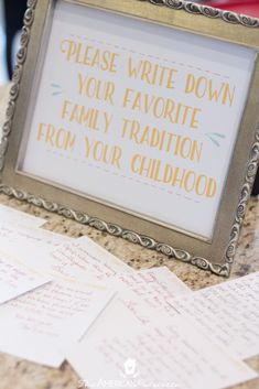 a framed sign that says please write down your favorite family tradition from your childhood