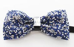 Beautiful pre-tied and adjustable double tiered banded bow tie Crystal Beaded Will adjust from 13" through 20" neck. Bow dimensions 2.5" x 4.5". Blue Ribbon Bow For Party, Blue Party Bow With Ribbon, Adjustable Butterfly Knot Bow Tie For Party, Adjustable Bow Tie For Summer Party, Summer Party Adjustable Bow Tie, Adjustable Blue Standard Bow Tie, Adjustable Blue Standard Tie Bow, Blue Adjustable Standard Tie Bow, Blue Bow Tie For Parties