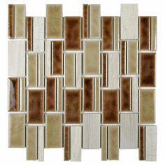 a white and brown mosaic tile wall