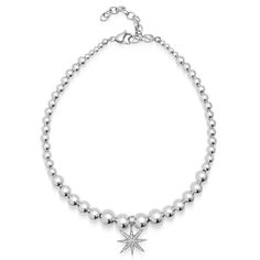 Introducing our Twilight Star Silver Choker, a perfect blend of contemporary edge and classic charm. This eye-catching choker features sleek silver beads, expertly paired with a radiant star pendant crafted in stainless steel and adorned with sparkling cubic zirconia stones. The cool tones of the silver beads and the shimmering CZ stones offer a celestial-inspired look that adds a modern touch to any ensemble. Whether worn alone or layered, this choker brings a refined, bold elegance to your everyday style. Pendant and lock in stainless steel with cubic zirconia stones. Preserve the elegance of your jewelry by avoiding direct contact with perfumes, body lotions, hairspray, and other chemicals. Always remove your jewelry before going to bed, bathing, showering, swimming, or engaging in phys Twilight Stars, Star Silver, Before Going To Bed, Body Lotions, Forever Jewelry, Going To Bed, Silver Choker, Jewelry Ring Box, Cool Tones