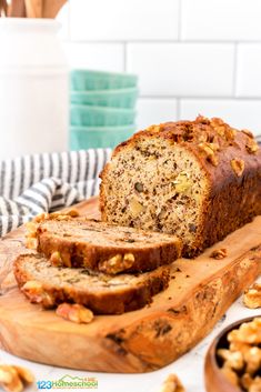 a loaf of banana nut bread on a cutting board