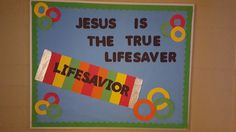 a bulletin board with the words jesus is the true lifesaver and an image of a candy bar