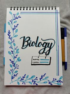 a notebook with the words biology written on it