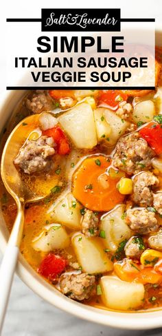 a white bowl filled with italian sausage and veggie soup