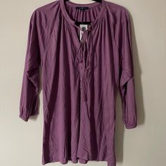 3/4 Sleeve Gap Blouse Brand New With Tag. Beautiful Purple Color With A Little Tie Up At The Neck. Casual Daywear Shirt By Gap, Casual Gap Shirt For Daywear, Casual Spring Tunic Shirt, Casual 3/4 Sleeve Beach Tops, Gap Short Sleeve Beach Tops, Gap Short Sleeve Tops For Beach, Gap Short Sleeve Tops For The Beach, Fall Beach Blouse With 3/4 Sleeves, Gap Long Sleeve Shirt For Spring