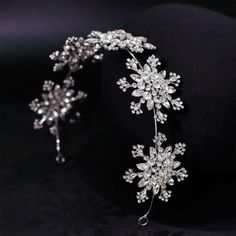 Description Elegant snowflake design adds a touch of glamour to your hairstyle ? Made with high-quality materials for durability and comfort Simple and easy to wear, perfect for weddings and special occasions Versatile accessory that can be paired with various hairstyles and outfits Makes a great gift for friends and family who love elegant and stylish accessories Sweet Wedding Dresses, Elegant Snowflake, Wedding Headdress, Snowflake Shape, Wedding Dresses With Flowers, Snowflake Design, Crystal Headband, Your Hairstyle