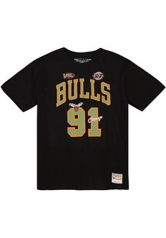 Show support for your favorite player in this Chicago Bulls Black Flight Dennis Rodman Short Sleeve Player Tee! This Player T Shirt features a lightweight material with screen printed team  and player graphics, so everyone will know you cheer for Chicago, Dennis Rodman! This is the perfect Bulls Player Tee for wearing from every day to game day. Go Bulls! Black Jersey T-shirt With Logo Print, Black Cotton T-shirt With Team Logo, Black T-shirt With Team Logo For Fans, Collegiate Black T-shirt For Streetwear, Throwback Sports T-shirt With Screen Print, Fan Apparel T-shirt With Front Print, Throwback Black T-shirt For Sports Events, Collegiate Black T-shirt For Sports Season, Black T-shirt With Letter Print For Game Day