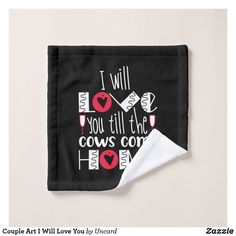 a black towel with the words i will you till cows come home on it and a white napkin