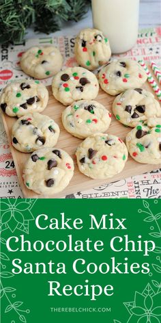 chocolate chip santa cookies on a cutting board next to a glass of milk