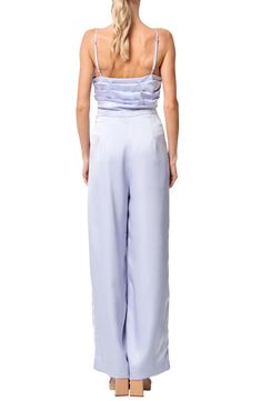 This party-ready jumpsuit is styled with a pleated bodice and finished with wide legs and handy pockets. 53" center front length; 30" inseam; 24" leg opening (size Medium) Scoop neck Adjustable straps Front slant pockets Lined 100% polyester Hand wash, line dry Imported Asian Owned/Founded Formal Full-length Jumpsuits And Rompers For Spring, Full Length Formal Jumpsuits And Rompers For Spring, Spring Evening Satin Jumpsuits And Rompers, Satin Jumpsuits And Rompers For Spring Party, Full Length Strapless Jumpsuit For Spring Party, Spring Party Strapless Full-length Jumpsuit, Spring Party Satin Jumpsuits And Rompers, Spring Party Full-length Strapless Jumpsuit, Elegant Wide Leg Jumpsuits And Rompers With Pockets