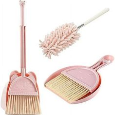 a pink dustpan and brush on a white background