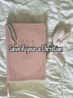 a pink book with the words save if your a christian written on it next to a spoon