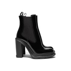 Black shine brush-off leather Chelsea boot with a thick rubber tread sole and stacked heel. The boot features tonal elastic side panels. Boot silhouette with a round toe shape. Finished with an Alexander McQueen signature on the sole. Material: 100% Calf Leather Made in Italy. Sku: 678530WHZ84-1000 Boot Silhouette, Black Alexander Mcqueen, Heeled Chelsea Boots, Black Chelsea Boots, Leather Chelsea Boots, Chelsea Boot, Side Panels, Stacked Heel, Calf Leather