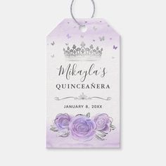 a purple and white wedding gift tag with roses on the front, and butterflies on the back