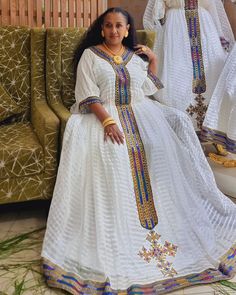 Embrace the true essence of Ethiopian Tilef making in magnificent fabric, Menen with this dress. It is handcrafted with great care and attention, making it ideal for any events. Material Cotton Menen Thread Estimated delivery : 2weeks to 3weeks Contact WhatsApp +1(304)-306-2784Email: contact@ethiopian.store Habesha Dress, Ethiopian Dress, Habesha Kemis, Wedding Dress Chiffon, Cultural Celebration, Dresses Chiffon, Wedding Dresses Simple, Bosnia And Herzegovina, Traditional Dresses