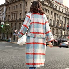 Feel like a model and style icon as you strut around the city in our Plaid Pattern Overcoat. Made from a heavyweight material, this unique double-breasted overcoat features a notch lapel, front flap pockets, large buttons, and sleeve straps to have all eyes on you. The unique red and blue color combination will make you feel like you’re on the cover of a fashion magazine! Casual Long Wool Coat With Pockets, Long Sweater Coat With Pockets, Winter Long Coat With Patch Pockets, Plaid Single Breasted Wool Coat, Plaid Single Breasted Long Sleeve Wool Coat, Plaid Single-breasted Wool Coat With Long Sleeves, Blue Wool Coat With Pockets For Fall, Winter Wool Coat With Patch Pockets, Winter Outerwear With Multiple Pockets And Lapel Collar