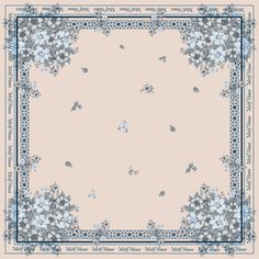 a blue and white floral design on a light pink background with an ornate border in the middle