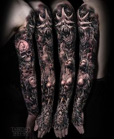 three sleeve tattoos with monsters and skulls on the arms, both in black and white