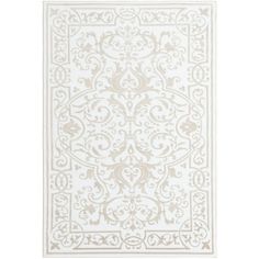 a white rug with an intricate design on it