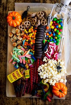 halloween candy and candies laid out on a table