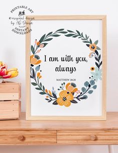 a framed print with the words i am with you, always written in floral wreath