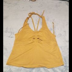 Awesome Tank Super Cute Is Kinda Short Depending How Tall U R...Me Its To Short N Im 5 Ft 9..So If You Need Measurements Just Ask..Great Deal N Ofeers R Welcome..Please Check Out All Pictures N Descriptions N If You Have A Question Please Feel Free To Ask...Great Look Boho Or Whatever U Got Going On... Fitted Mustard Sleeveless Top, Mustard Fitted Sleeveless Top, Fitted Gold Top For Beach, Fitted Gold Tops For Beach, Fitted Gold Top For The Beach, Yellow Summer Tank Top For Day Out, Mustard Tank Top For Spring, Fitted Mustard Top For Beach, Trendy Yellow Tank Top For Vacation