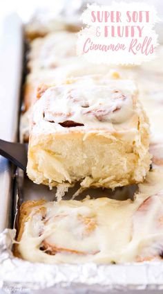 a close up of some food in a pan with a fork on it and one piece being lifted out