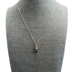 This 14k gold filled chain has a wire wrapped genuine teardrop emerald pendant. It is a dainty and simple necklace is perfect for everyday wear and is the perfect piece for layering necklaces. * 6x10mm natural raw emerald briolette faceted teardrop - natural gemstone, please keep in mind that the size and color may vary slightly. * natural emerald faceted beads * 2mm 14k gold filled round beads * 14k gold filled delicate tiny paperclip chain and lobster clasp - Our 14k Gold filled products are made in the USA * 24k gold filled extender chain * All components are gold filled ✨made to order Dainty Wire Wrapped Teardrop Necklace, Dainty Teardrop Wire Wrapped Necklace, Minimalist Wire Wrapped Teardrop Necklaces, Raw Emerald, Layering Necklaces, Emerald Pendant, Simple Necklace, Natural Emerald, Gold Filled Chain