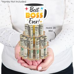 a person holding stacks of money with the words best boss ever