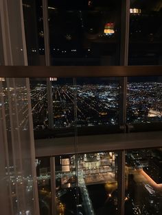 a view from the top of a skyscraper at night