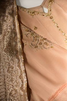 Elegant Sharara With Gold Embroidery In Traditional Drape, Elegant Sharara With Gold Embroidery And Traditional Drape, Elegant Sharara With Gold Embroidery, Elegant Festive Sharara With Gold Embroidery, Festive Elegant Sherwani With Sheer Dupatta, Elegant Sharara With Gold Embroidery For Festive Occasions, Elegant Sharara With Gold Embroidery For Wedding, Elegant Gold Sharara With Intricate Embroidery, Elegant Wedding Sharara With Gold Embroidery