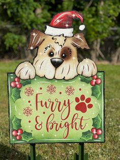 a sign that says furry and bright with a dog wearing a santa hat on it