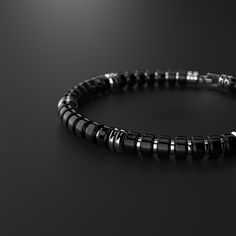 Step into a realm of refined elegance with the Seekers Premium Spacer Bracelet, a 6mm embodiment of sophistication. This piece is not just an accessory; it's a testament to your journey of personal growth and spiritual refinement. With its premium design and subtle detailing, it complements your path towards becoming the best version of yourself. Ideal for both formal and casual settings, this bracelet is a symbol of your commitment to a life of style, depth, and introspection. All our stones ar Modern Black Bracelets With Black Beads, Modern Silver Beaded Bracelet With Black Beads, Modern Silver Bracelet With Black Beads, Modern Black Round Bead Bracelets, Minimalist Black Onyx Bracelet, Classic Black Onyx Bracelets, Classic Black Onyx Bracelet, Modern Black Bracelets With 8mm Beads, Modern Black Bracelet With 8mm Beads