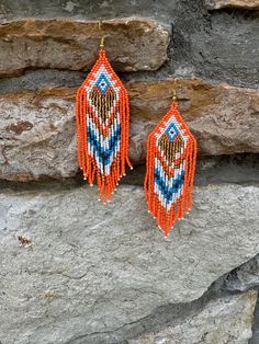 Brick stitch earrings with fringe Orange Fringe Dangle Earrings, Bohemian Orange Fringe Earrings, Orange Beaded Fringe Jewelry, Orange Fringe Beaded Earrings As Gift, Orange Beaded Fringe Earrings As Gift, Orange Tassel Dangle Earrings, Orange Fringe Beaded Earrings For Gift, Orange Dangle Tassel Earrings For Festival, Orange Fringe Tassel Earrings For Gift