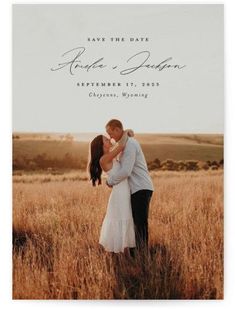 an image of a couple kissing in a field with the words save the date written on it