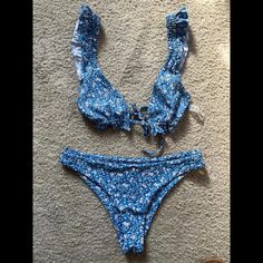 Blue Floral Ruffle Bikini - Never Worn Blue Ruffled Swimwear For Sunbathing, Blue Ruffled Swimwear For Beach, Blue Ruffled Swimwear For Beach Season, Blue Ruffled Swimwear For Poolside, Blue Ruffled Swimwear For Vacation, Blue Ruffled Swimwear For Beachwear, Blue Ruffled Swimwear For Summer, Floral Ruffle, Blue Floral