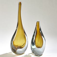 Dimensions: Large: 6.75"L x 4"W x 16.5"H (10 lbs) Small: 6"L x 3.5"W x 11"H (8.8 lbs) Color: Amber, Grey Handwash with cotton cloth Product is Watertight The Stretched Neck Vase is unique mouth blown art glass. France and Son is an authorized seller of this product. Contemporary Vases, Vases For Sale, Global Views, Bottle Vase, Table Vases, Old Furniture, Furniture Removal, Glass Table, Custom Items