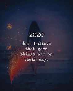 a woman walking on the beach with fireworks in the background and text that reads, just believe that good things are on their way