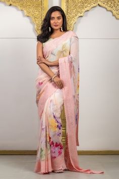 Pink saree in tissue base with all over gardenia print and floral embroidery on the border. Comes with an unstitched blouse piece. - Aza Fashions Spring Wedding Saree With Floral Print, Spring Georgette Saree With Floral Embroidery, Unstitched Floral Print Saree For Spring, Spring Bollywood Style Floral Saree, Pink Floral Print Saree For Spring, Semi-stitched Floral Print Saree For Spring, Semi-stitched Saree With Floral Print, Spring Floral Print Pink Saree, Bollywood Semi-stitched Pre-draped Saree With Floral Print