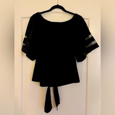 Brand New Without Tags. Size Medium. Can Be Worn On Or Off The Shoulders. Tie Front And Bell Sheer Sleeves Black Stretch Blouse For Office, Casual Short Sleeve Blouse For Evening, Casual Short Sleeve Evening Blouse, Black Short Sleeve Blouse For Evening, Casual Black Evening Blouse, Black Short Sleeve Evening Blouse, Black Short Sleeve Blouse For Night Out, Black Short Sleeve Evening Top, On Or Off