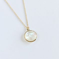 "Mother of pearl pendant necklace available in oval, round and rectangular shape suspended from a 14k gold-filled delicate chain. Available in 16\", 18\" and 20\" Chain: 14kt gold-filled Pendant size(including loop): Rectangle 9 X 27 mm, Circle 14 mm, Tear Drop: 10.6 X 18.5 mm Available in 14kt gold-filled Listing is for one necklace Let's keep in touch, sign up for our newsletter and receive 15% off your first order https://lp.constantcontact.com/su/Dpyaymg" Classic Mother Of Pearl Necklace As Gift, Elegant 14k Gold Filled Charm Necklace For Mother's Day, Round Pearl Pendant Jewelry For Bridesmaid Gift, Minimalist Mother Of Pearl Necklace As A Gift, Minimalist Mother Of Pearl Necklace As Gift, Minimalist Gold Jewelry With Mother Of Pearl, Gold Pearl Pendant Jewelry For Bridesmaid Gift, Dainty Pearl Pendant Necklace With Mother Of Pearl, Gold Oval Necklace With Mother Of Pearl