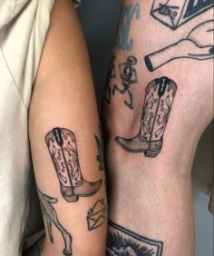 two people with matching tattoos on their arms