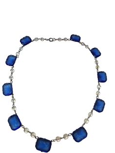 This Art Deco Necklace features ten emerald cut, blue glass, prong set cameos on a silver link chain with clear glass crystal spacers. Measures 19" long, cameos are 11/16" x 1/2" Elegant Blue Faceted Necklaces, Blue Glass Necklace, Elegant Blue Faceted Necklace, Vintage Blue Glass Necklace, Elegant Blue Murano Glass Necklace, Silver Link Chain, Art Deco Necklace, Cameo Necklace, Wedding Jewellery Necklace