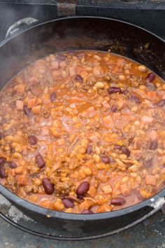 a large pot filled with lots of beans and meat