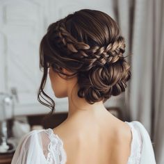 Look sophisticated with updos featuring Dutch braids. Perfect for any occasion. Save this pin for sophisticated hairstyle ideas! #DutchBraids #Updo #BlackWomen #SophisticatedStyle Loose Updo With Braid, Bride Braided Hairstyles Half Up, Low Bun Hairstyles For Homecoming, Braid Styles For Wedding, Updo Hairstyles Homecoming, Simple Updo With Braid, Wedding Updos Braids, Half Up Wedding Hair With Braid, Wedding Hair Updo Brown Hair