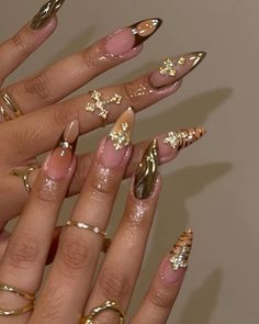 @nailedxamyy Almond Shape Nails Fall Design, Baddie Nails With Gems, Dearra Taylor Nails, Long Almond Gel X Nails, Dark Feminine Aesthetic Nails, Almond Nails Long Baddie, Red And Gold Nails Design, Ethereal Nails Aesthetic, Stiletto Nails With Charms