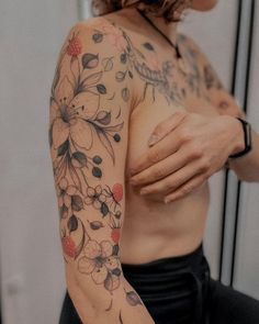 a woman with a tattoo on her arm