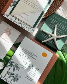 wedding stationery with starfish, palm tree and beach theme on green envelopes