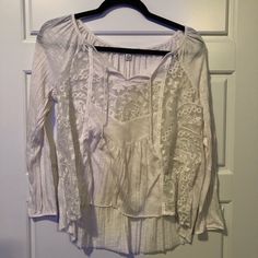 This Is A Super Cute Shirt With A Lot Of Really Pretty, Dainty, Detail! I’ve Only Worn It A Few Times So It’s Basically Brand New! Casual Lace Top Blouse For Brunch, Casual White Peasant Top For Fall, Casual Cotton Lace Top Blouse, Casual Lace Peasant Top For Spring, American Eagle Flannel Shirts, American Eagle Babydoll Top, American Eagle Graphic Tees, American Eagle Shirt, Cute Shirts